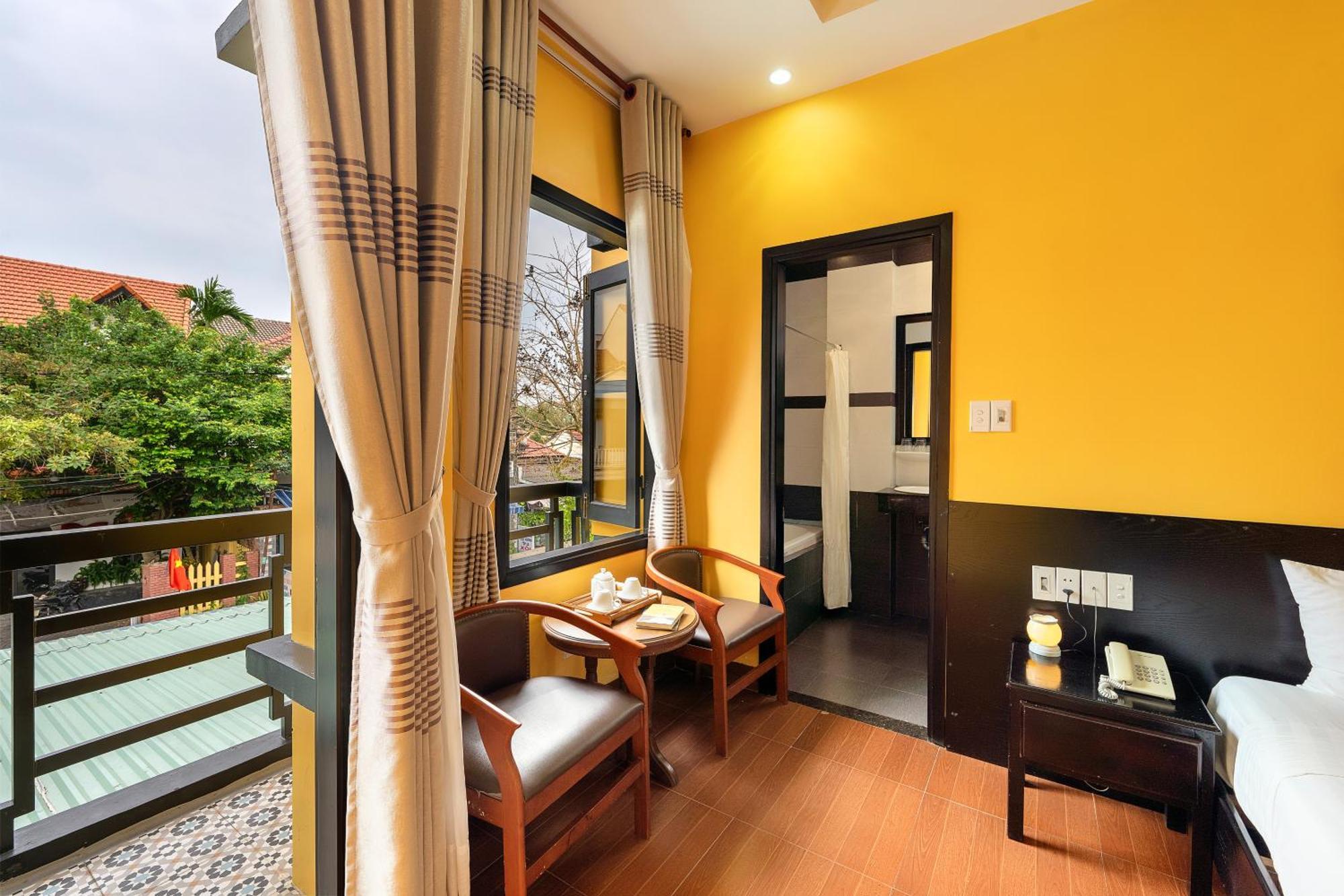 Golden Bell Homestay Хойан Экстерьер фото