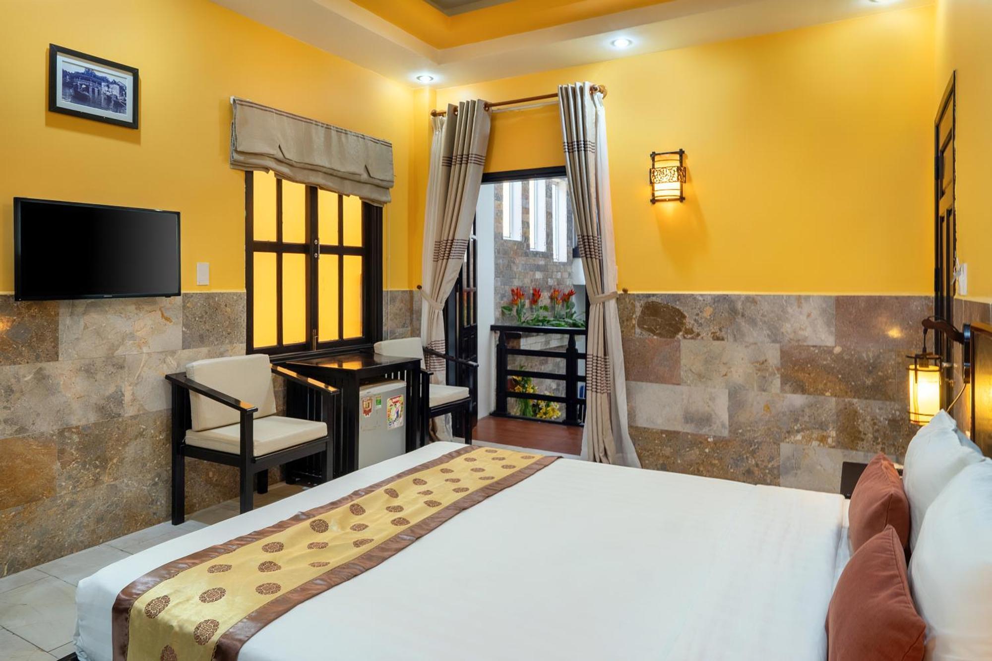Golden Bell Homestay Хойан Экстерьер фото
