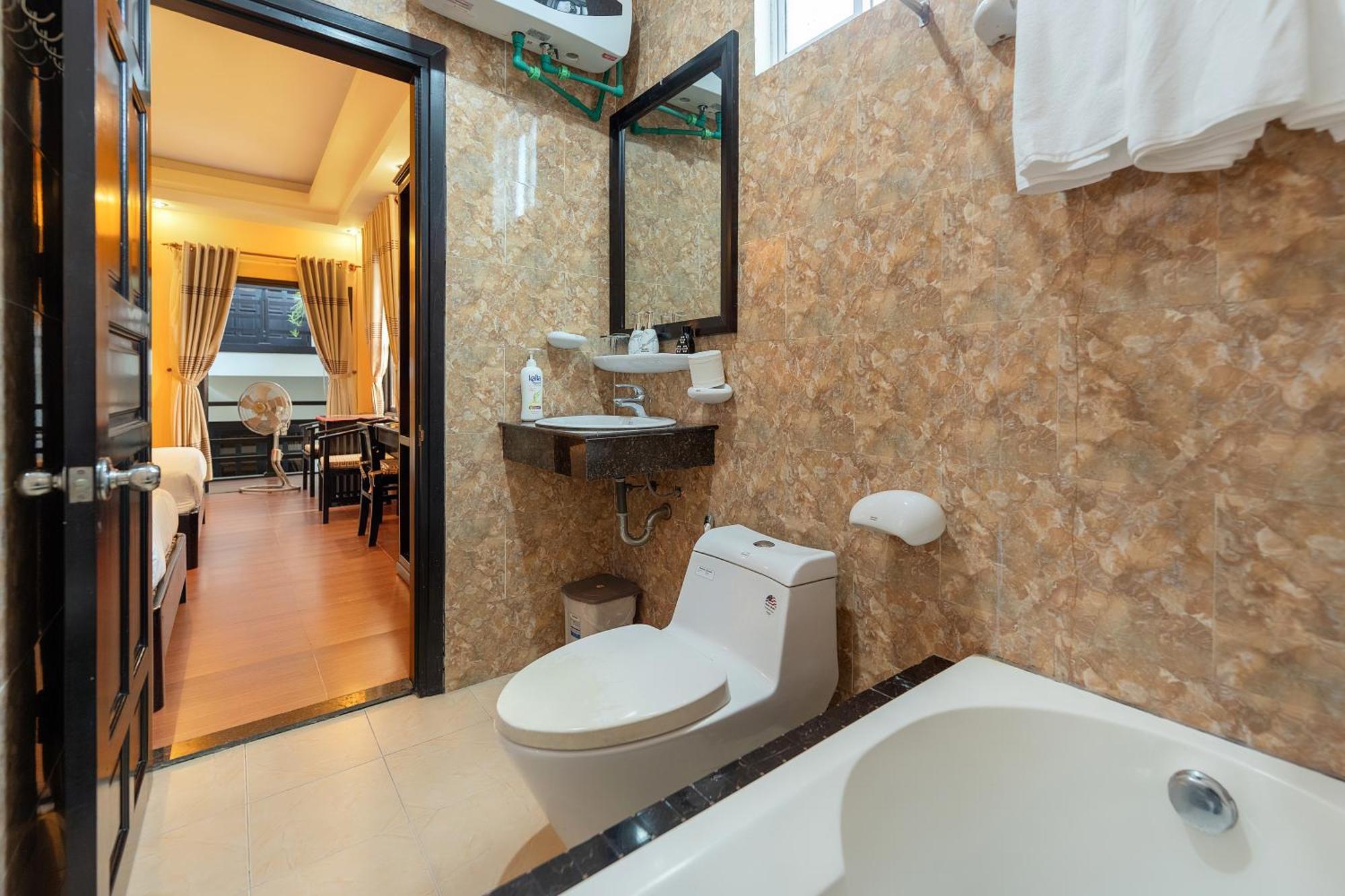 Golden Bell Homestay Хойан Экстерьер фото