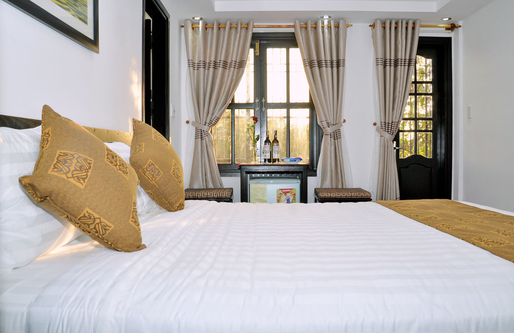 Golden Bell Homestay Хойан Экстерьер фото