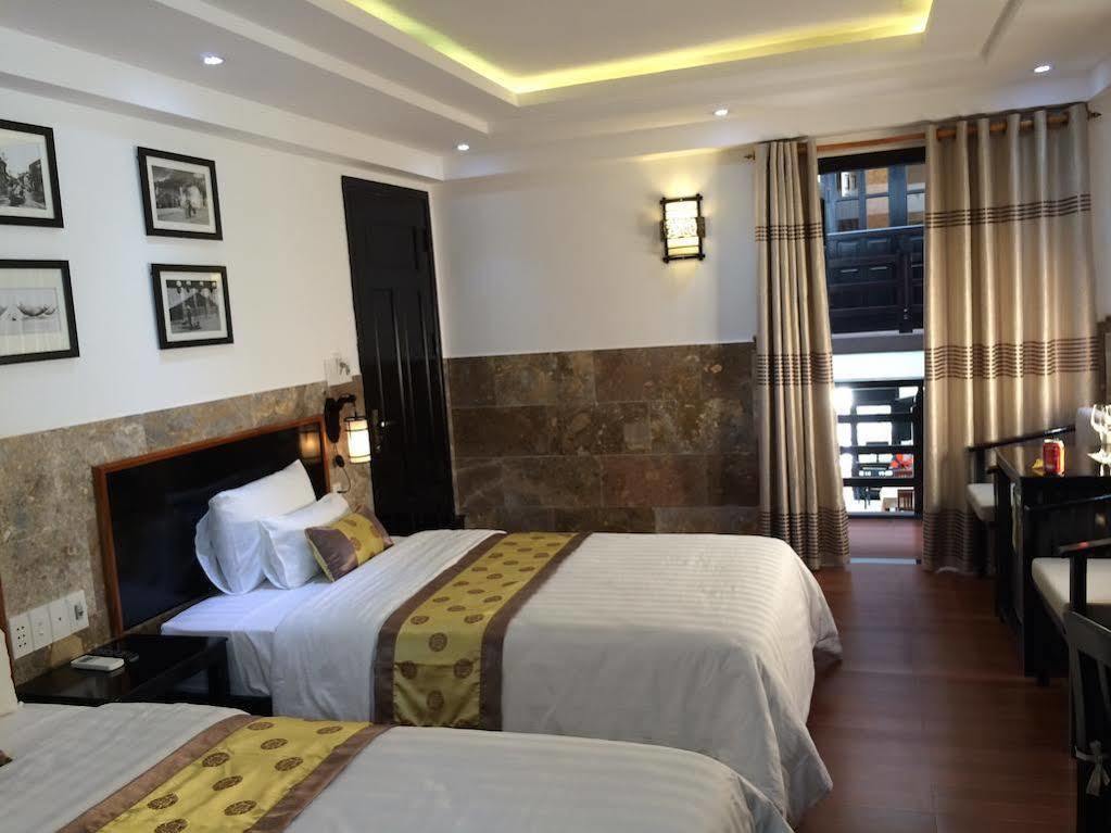 Golden Bell Homestay Хойан Экстерьер фото